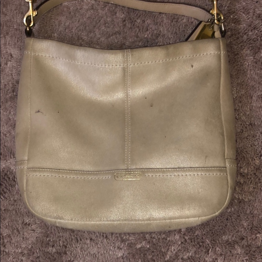 Coach shimmer crossbody bag. Moving need it gone